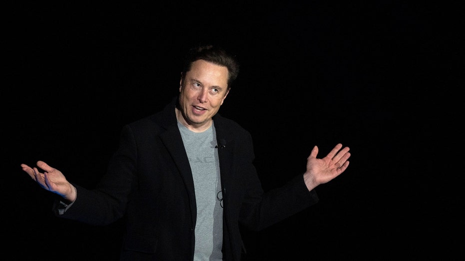 Elon Musk announces Grok Bot at a recent press conference.