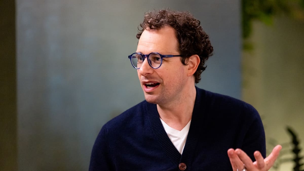 Dario Amodei emphasizes innovation through a comprehensive vision for AI development.